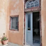Вилла Oia's Heritage Captain Mansion *